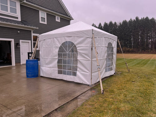White outdoor 10x10 tent rental for a holiday gathering in Northeast Ohio.