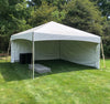 A white 15x15 tent set up for a graduation party in Broadview Heights, OH.