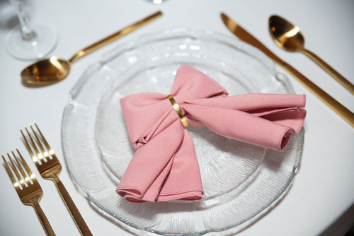 Beautiful wedding place setting with gold flatware set up in northeast Ohio.
