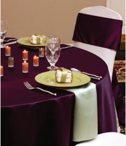 Purple matte satin linen with ivory napkins.